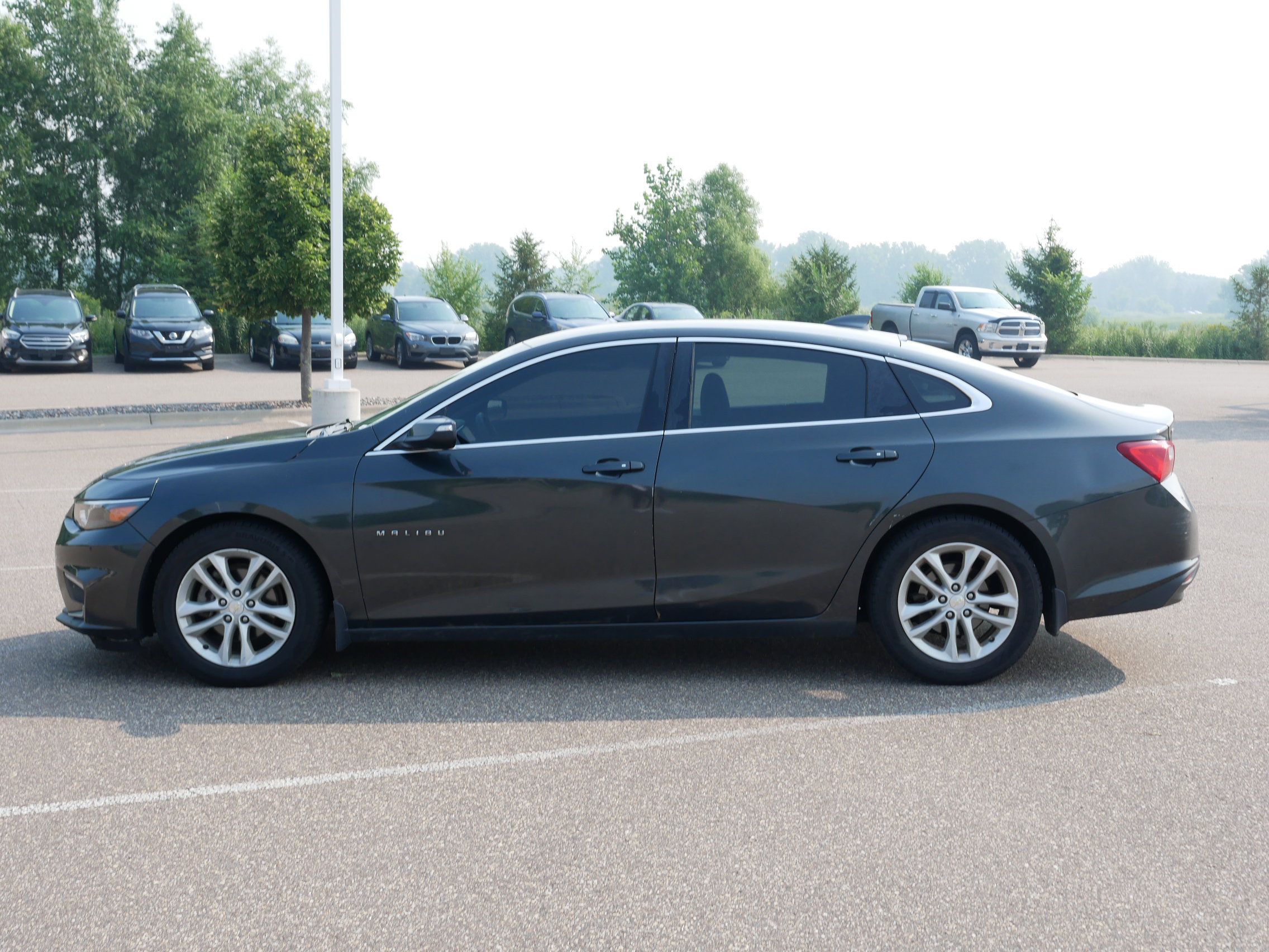 Used 2016 Chevrolet Malibu 1LT with VIN 1G1ZE5ST0GF344215 for sale in Coon Rapids, Minnesota