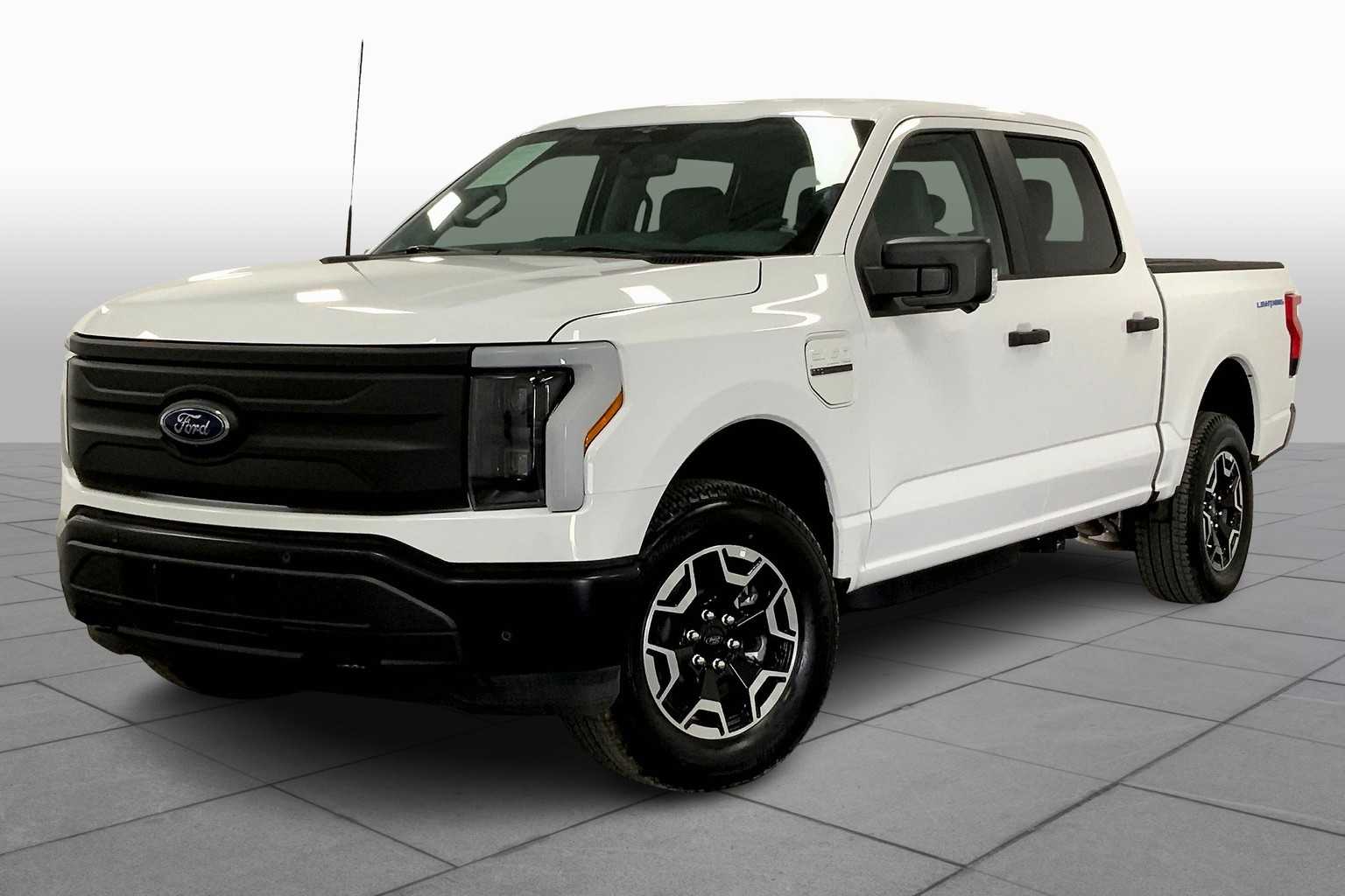 Used 2023 Ford F-150 Lightning Pro with VIN 1FT6W1EV4PWG09778 for sale in Austin, TX