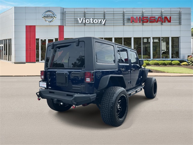2013 Jeep Wrangler Unlimited Freedom photo 3