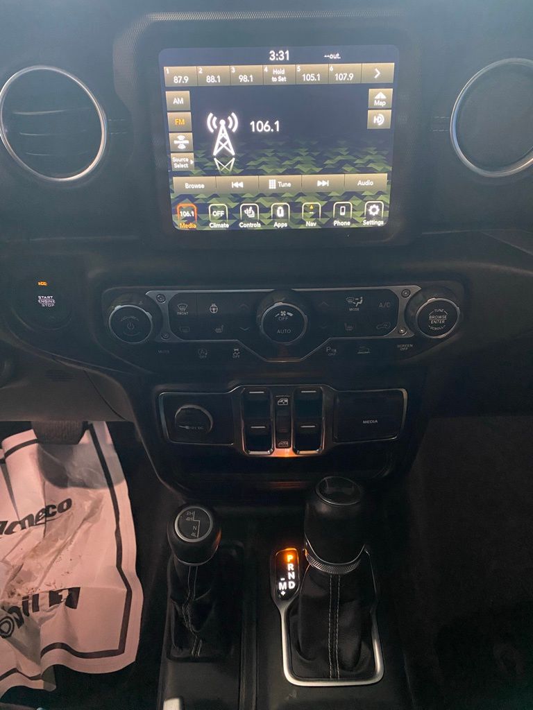 Used 2022 Jeep Wrangler Unlimited Sahara with VIN 1C4HJXEGXNW106409 for sale in Elk River, Minnesota