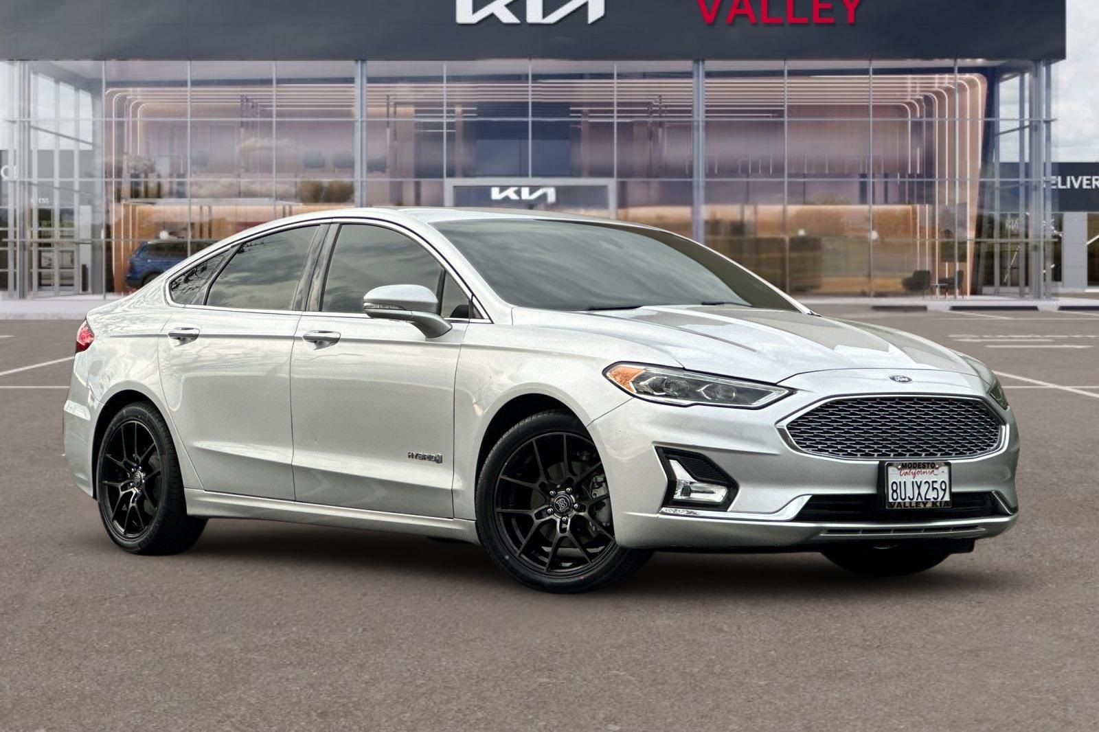 Used 2019 Ford Fusion Hybrid Titanium with VIN 3FA6P0RU7KR217047 for sale in Modesto, CA