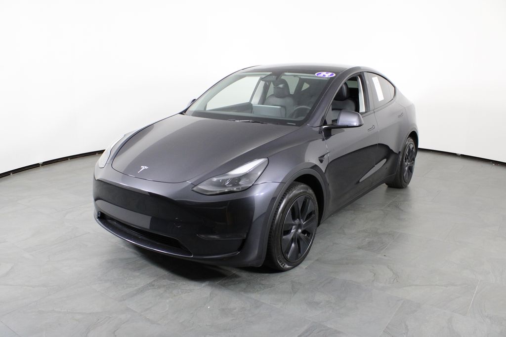 Used 2024 Tesla Model Y Long Range with VIN 7SAYGDED4RF098291 for sale in Orlando, FL