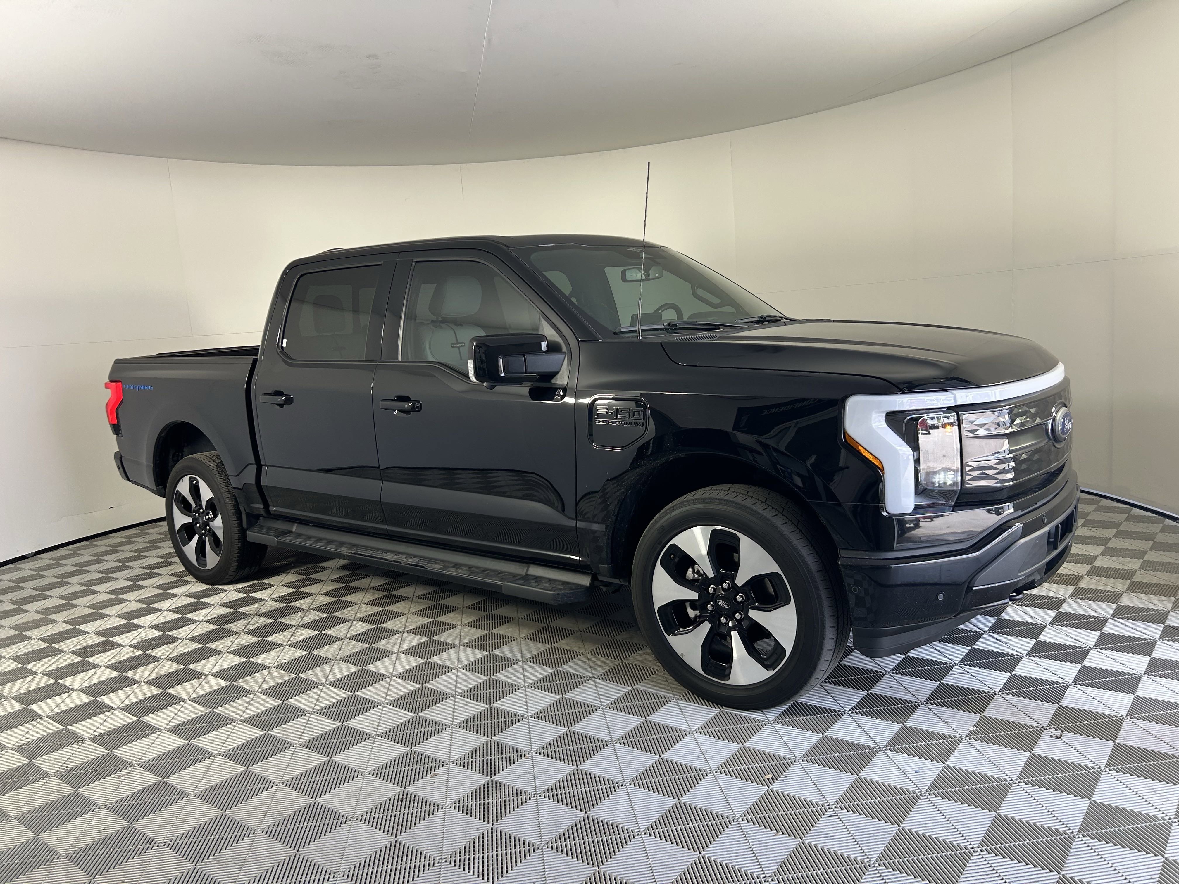 Used 2023 Ford F-150 Lightning Platinum with VIN 1FT6W1EVXPWG07839 for sale in Port Richey, FL