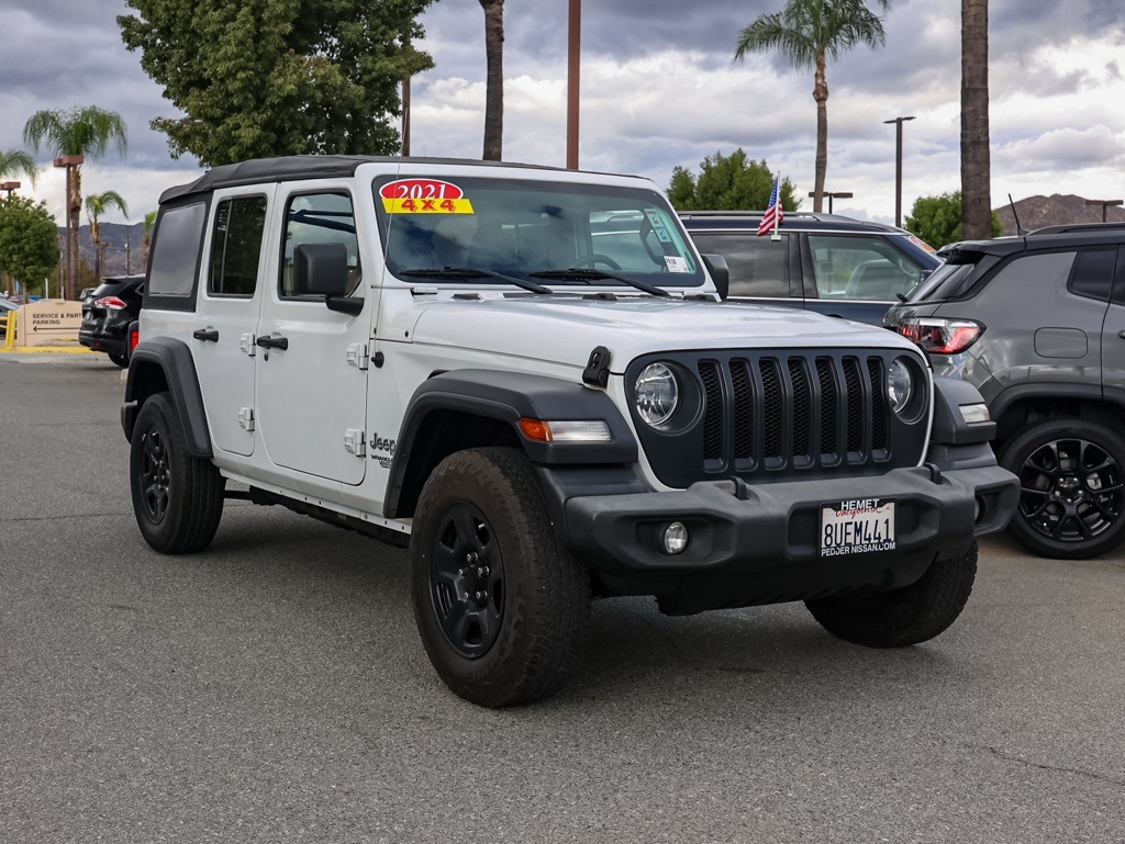 Used 2021 White Jeep Unlimited Sport image 1