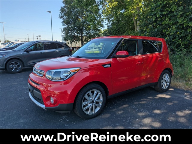 Used 2018 Red Kia Plus image 1