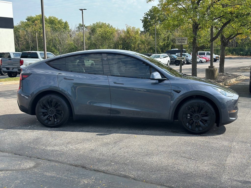 Used 2024 Tesla Model Y Long Range with VIN 7SAYGDEE4RA217463 for sale in St. Charles, IL
