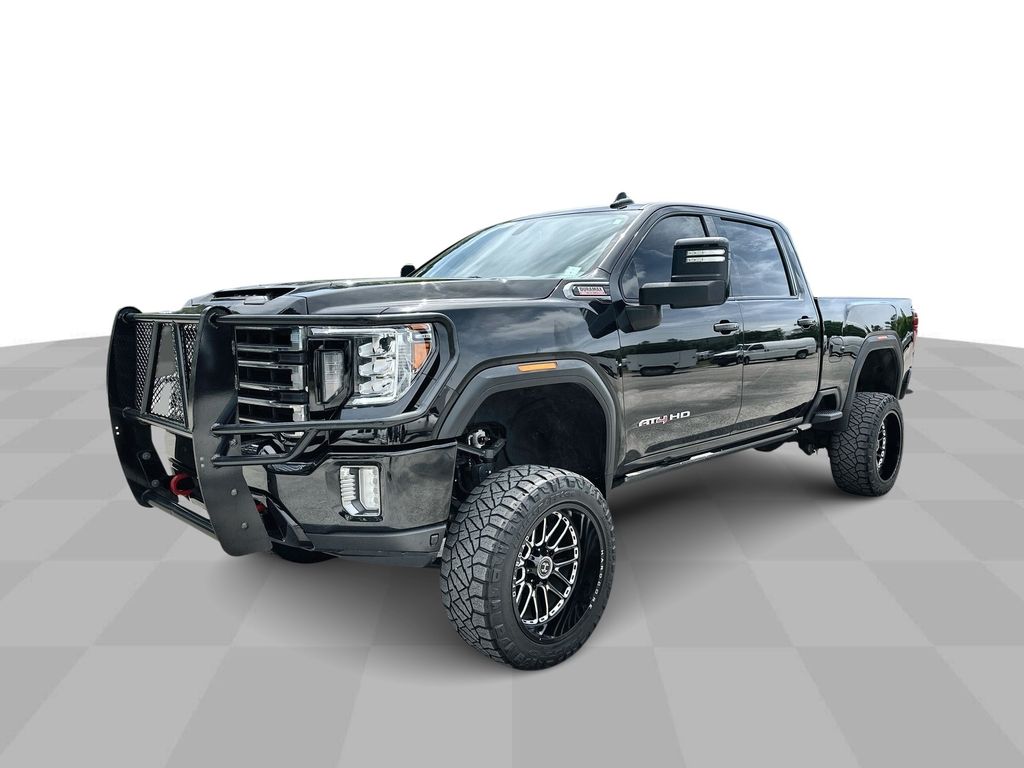 Used 2023 Ebony Twilight Metallic GMC AT4 image 1