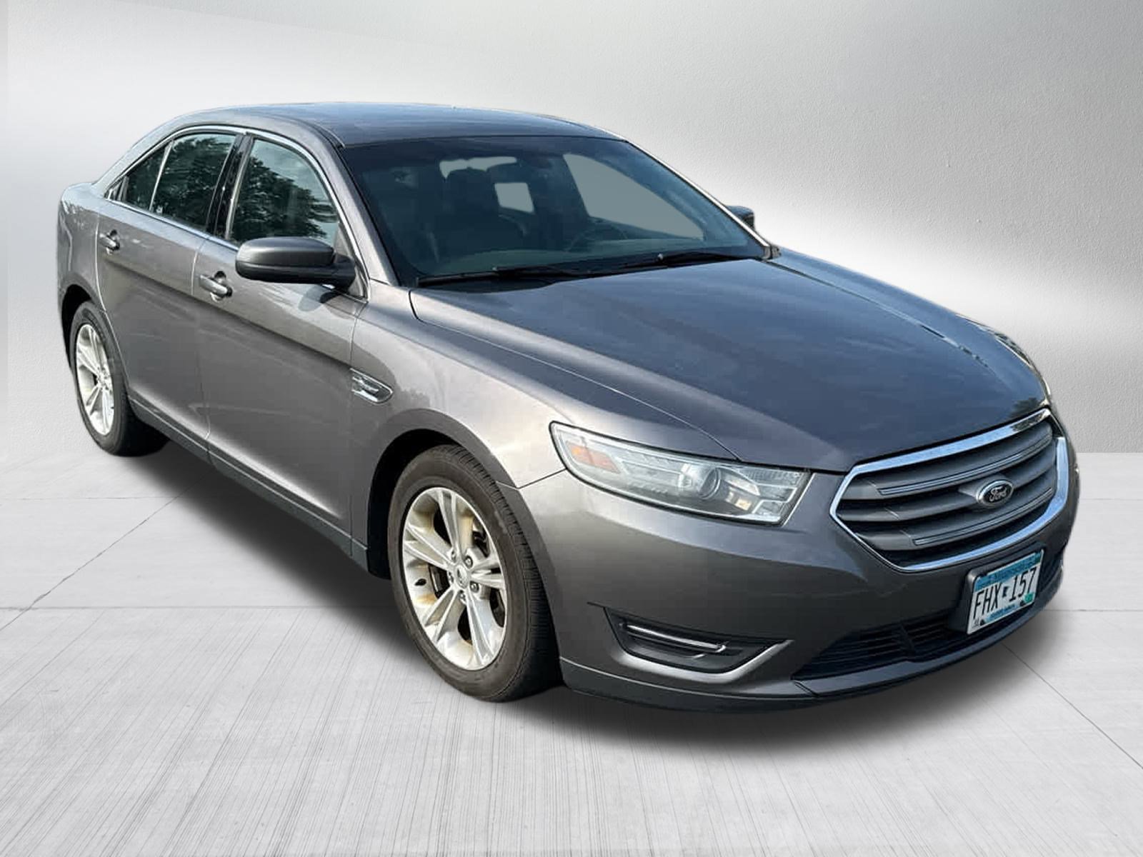 Used 2013 Ford Taurus SEL with VIN 1FAHP2E8XDG192877 for sale in Coon Rapids, Minnesota