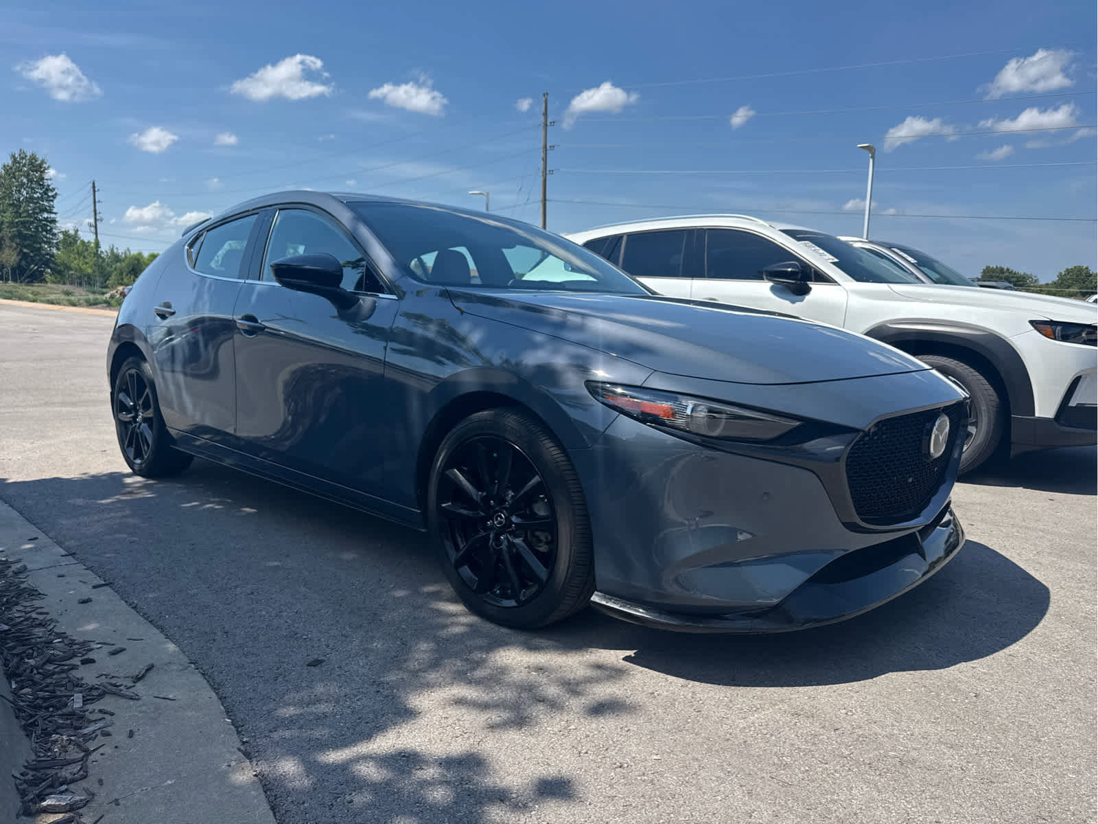 Used 2021 Mazda Mazda3 Premium Plus with VIN JM1BPBNY6M1403060 for sale in Kansas City