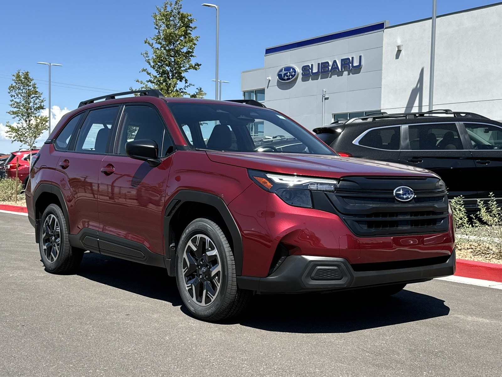 Used 2025 Crimson Red Pearl Subaru  image 1