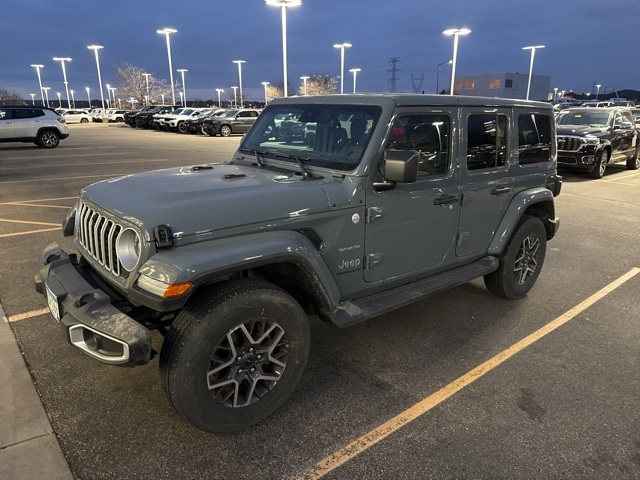 Used 2024 Jeep Wrangler 4-Door Sahara with VIN 1C4PJXEN8RW120356 for sale in Shakopee, Minnesota