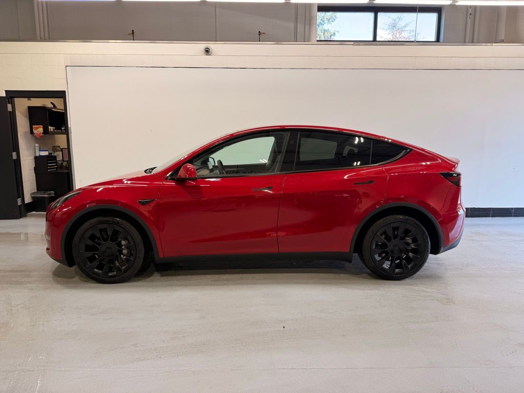 Used 2023 Tesla Model Y Long Range with VIN 7SAYGDEE9PA177443 for sale in Golden Valley, Minnesota