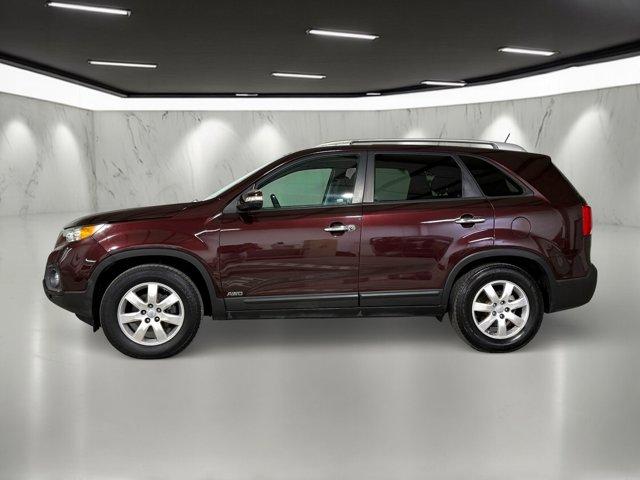 Used 2012 Kia Sorento LX with VIN 5XYKTCA66CG222707 for sale in Orlando, FL