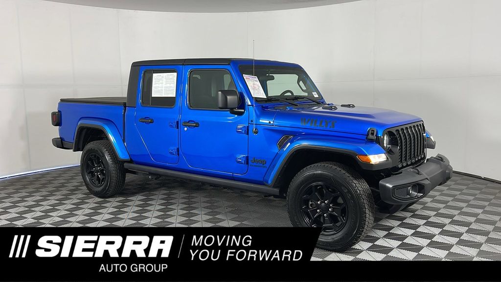 Used 2021 Blue Jeep Sport image 1