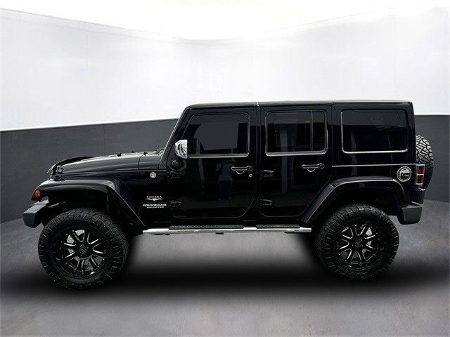 Used 2012 Jeep Wrangler Unlimited Sahara with VIN 1C4HJWEG5CL196173 for sale in Kansas City