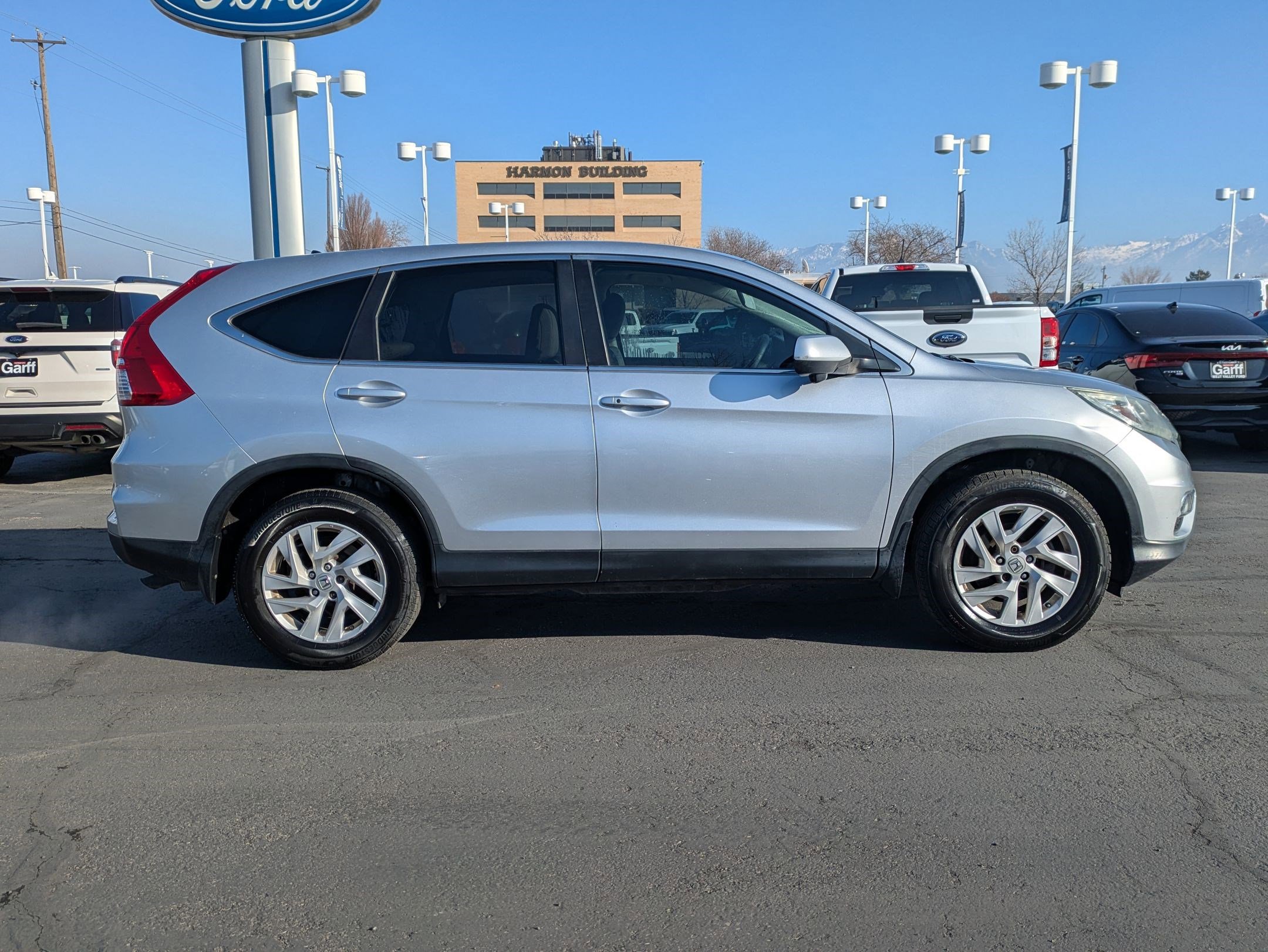 Used 2016 Honda CR-V EX with VIN 3CZRM3H57GG711627 for sale in West Valley City, UT