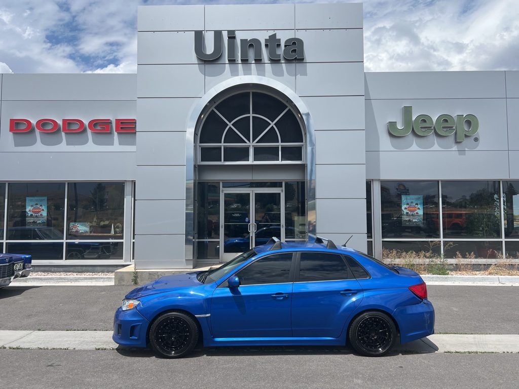 Used 2014 Subaru Impreza WRX with VIN JF1GV7E66EG002569 for sale in Evanston, WY