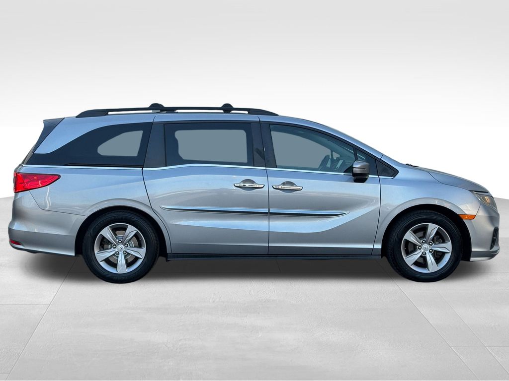 Used 2018 Honda Odyssey EX-L with VIN 5FNRL6H77JB062064 for sale in Coon Rapids, Minnesota