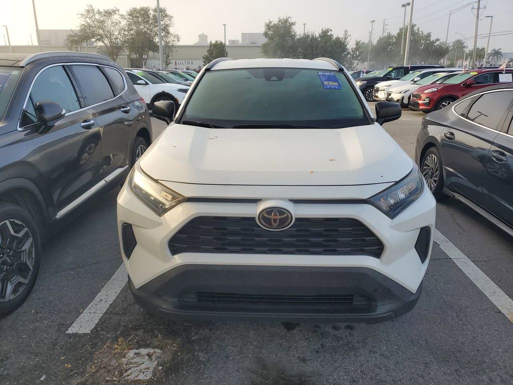 Used 2021 Toyota RAV4 LE with VIN 2T3H1RFV4MW123695 for sale in Kansas City