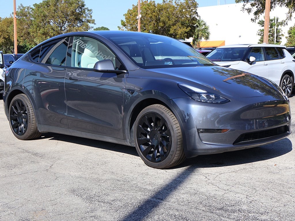 Used 2023 Tesla Model Y Base with VIN 7SAYGDED9PF945884 for sale in Northfield, Minnesota