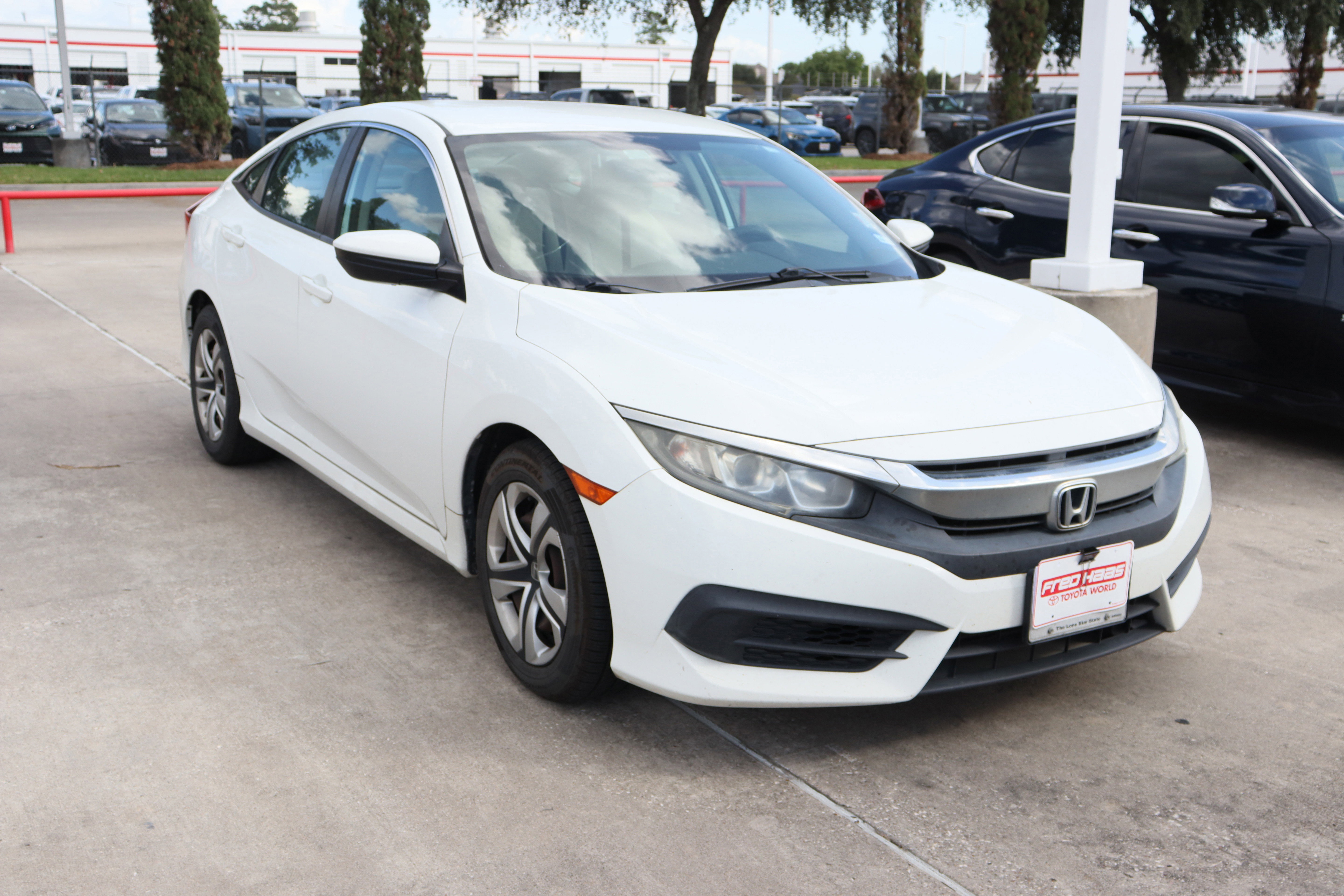 Used 2017 Honda Civic LX with VIN 19XFC2F59HE013297 for sale in Spring, TX