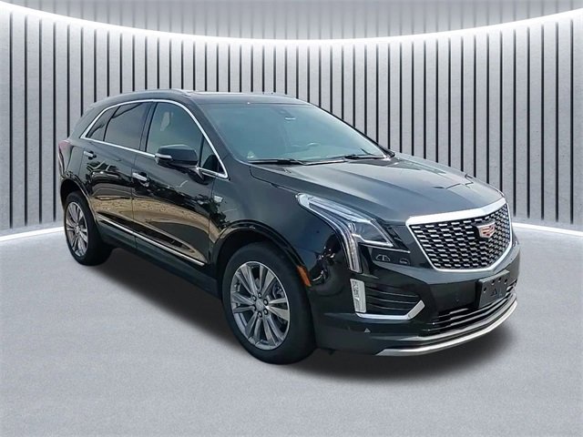 Used 2024 Stellar Black Metallic Cadillac Premium Luxury image 1