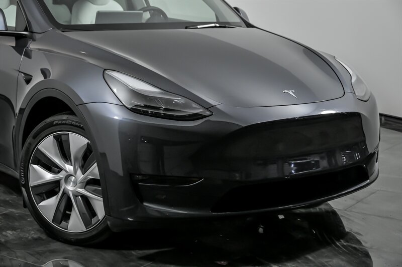 Used 2023 Tesla Model Y Long Range with VIN 7SAYGDEE6PF877830 for sale in Aurora, IL