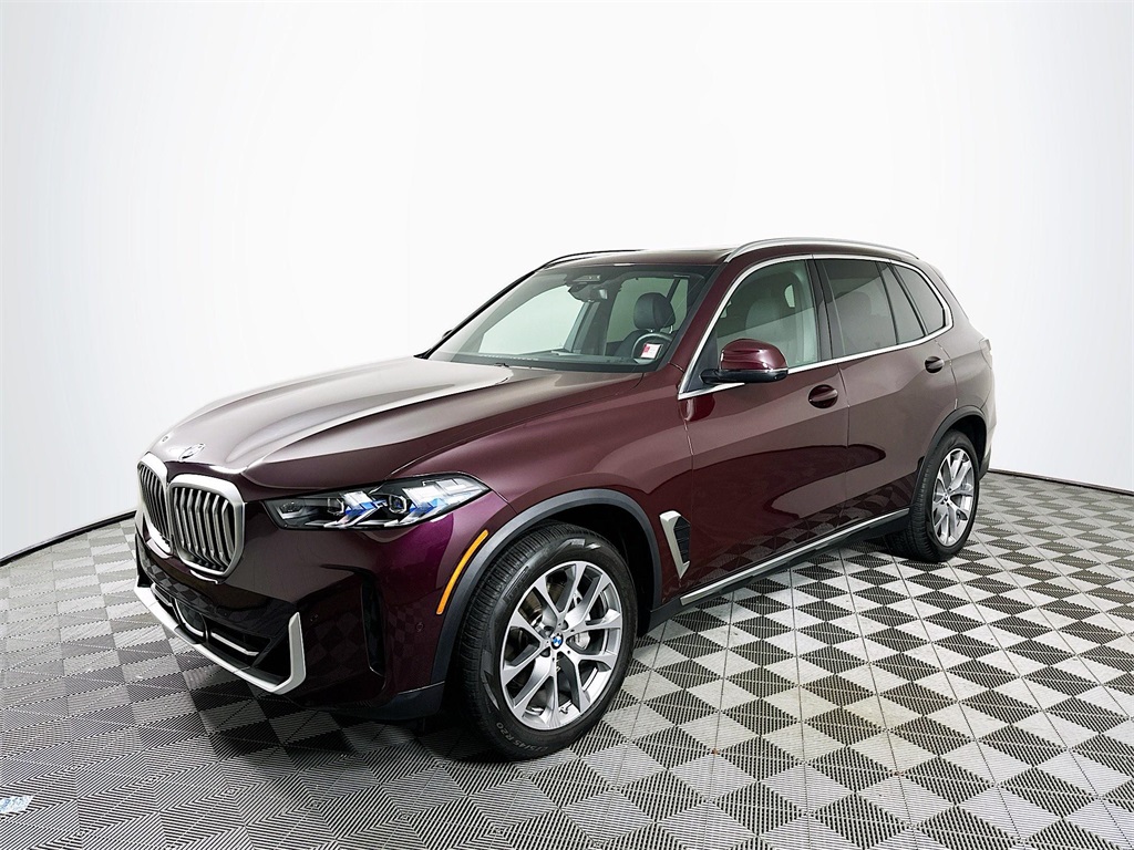 Certified Used 2024 Ametrin Metallic BMW xDrive40i image 1