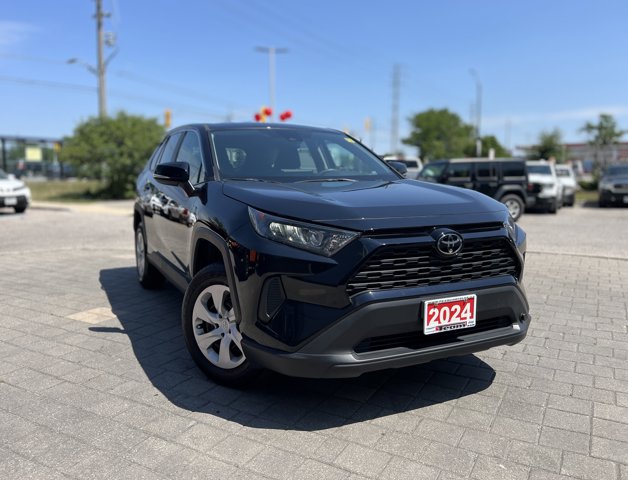 Used 2024 Midnight Black Metallic Toyota LE image 1
