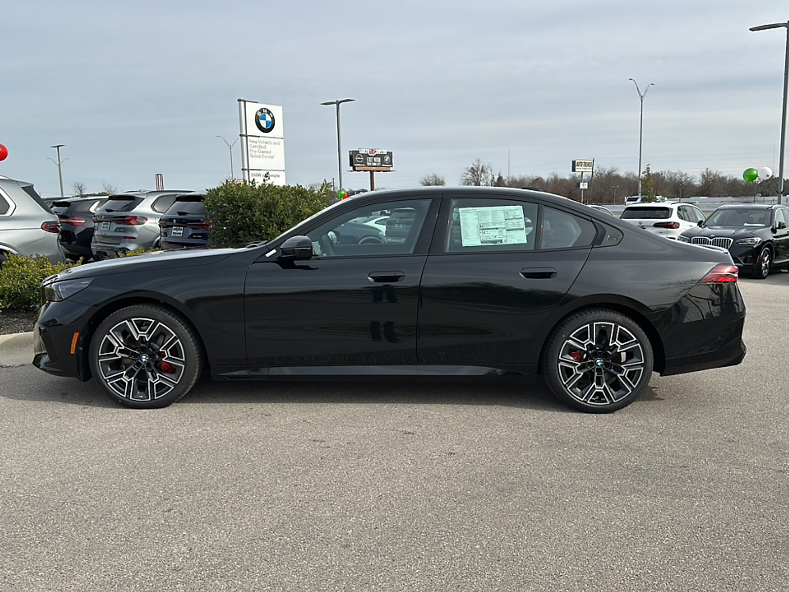 New 2025 Black Sapphire Metallic BMW i image 6