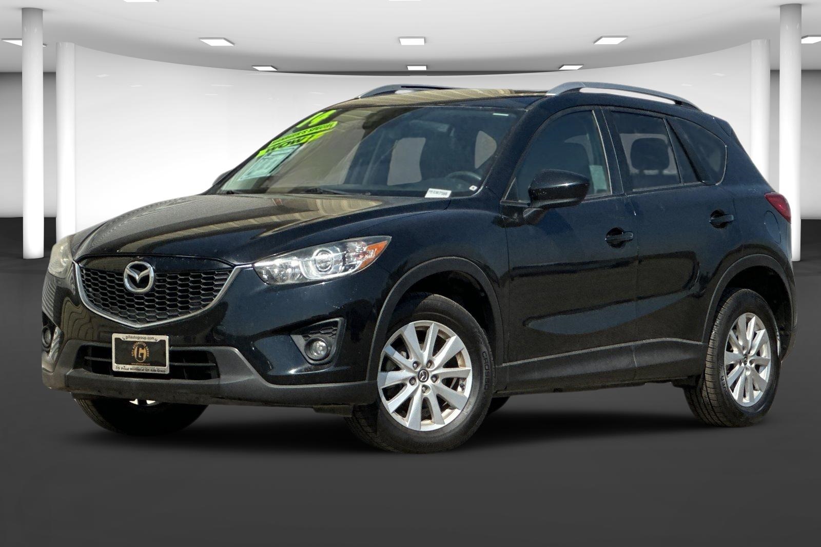 Used 2014 Mazda CX-5 Touring with VIN JM3KE2CY5E0302566 for sale in Madera, CA