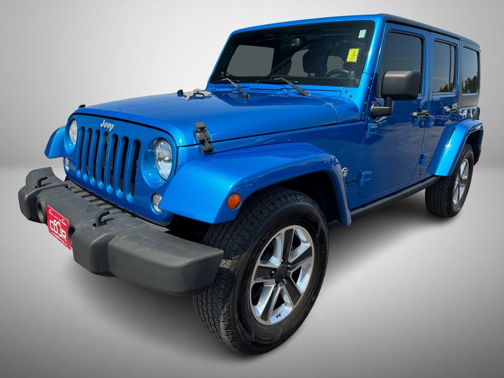 Used 2014 Jeep Wrangler Unlimited Freedom Edition with VIN 1C4BJWDG9EL160903 for sale in Albertville, AL