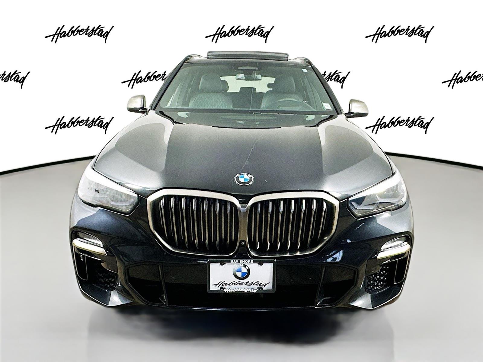 Used 2021 Black Sapphire Metallic BMW M50i image 2
