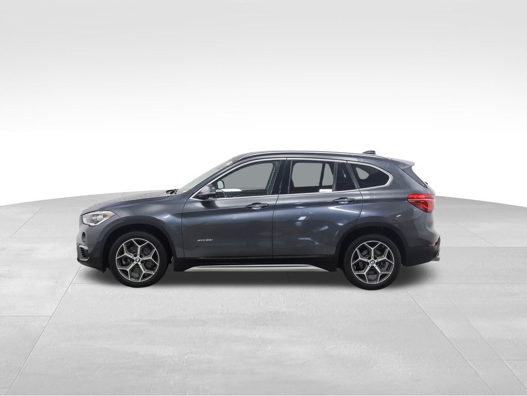 Used 2016 BMW X1 28i with VIN WBXHT3C3XGP885099 for sale in Minneapolis, Minnesota