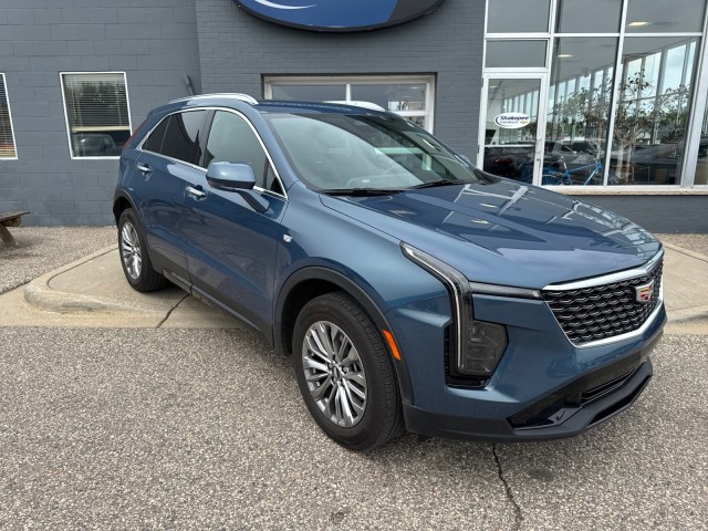 Used 2024 Deep Sea Metallic Cadillac Premium Luxury image 1