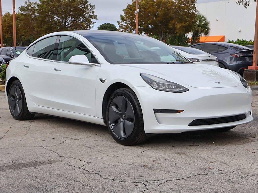 Used 2019 Tesla Model 3 Base with VIN 5YJ3E1EA9KF484146 for sale in Miami, FL