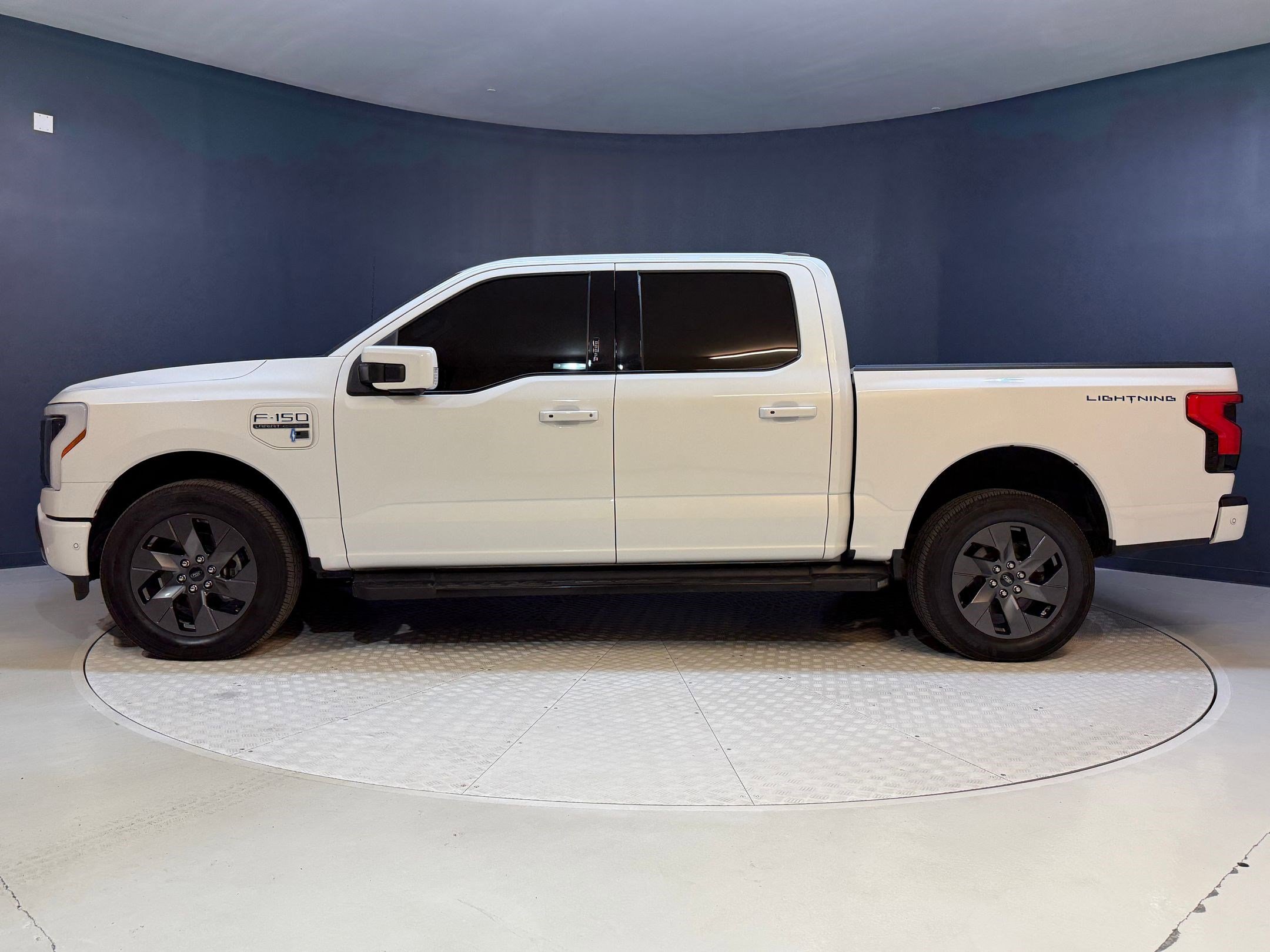 Used 2022 Ford F-150 Lightning Lariat with VIN 1FTVW1EV3NWG03611 for sale in Orlando, FL