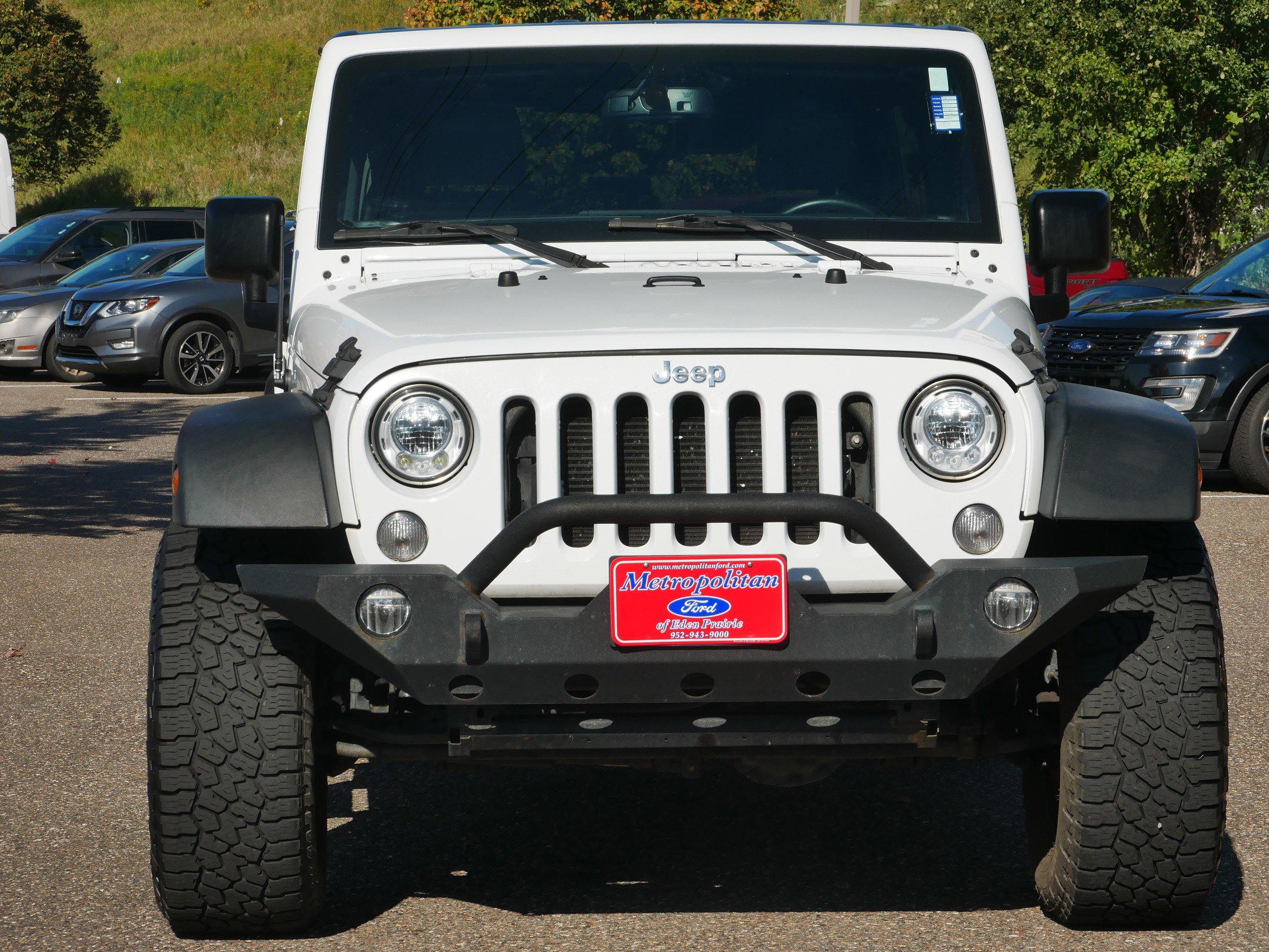 Used 2017 Jeep Wrangler Unlimited Sport S with VIN 1C4BJWDG5HL592036 for sale in Eden Prairie, Minnesota
