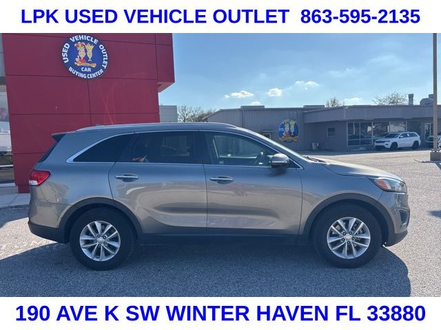 Used 2016 Kia Sorento LX with VIN 5XYPG4A32GG114807 for sale in Winter Haven, FL