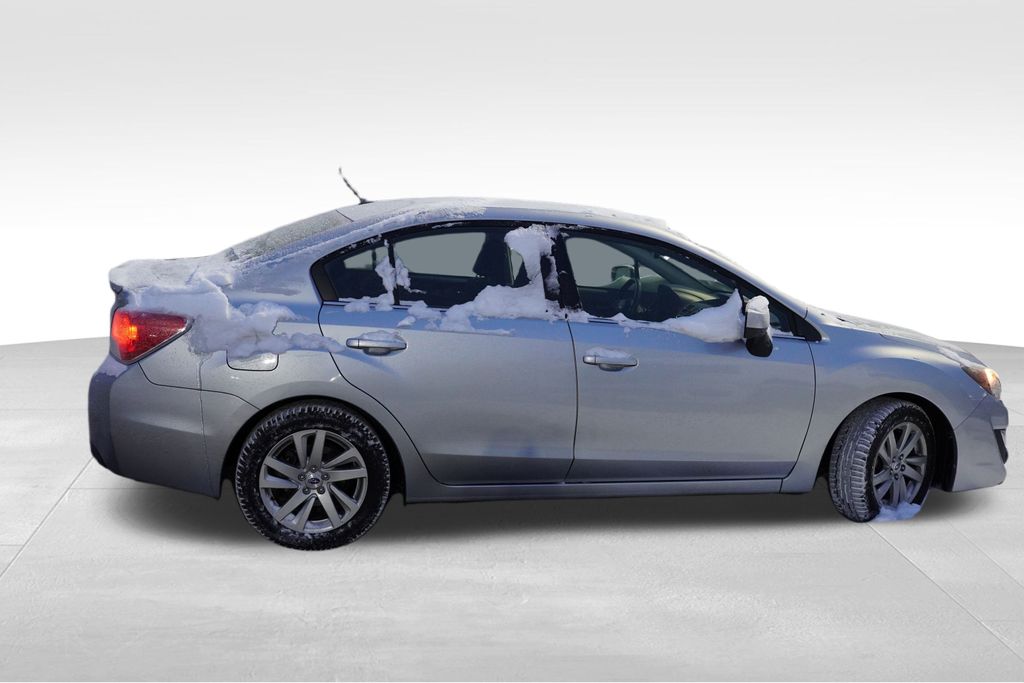 Used 2015 Subaru Impreza Premium with VIN JF1GJAC6XFH020581 for sale in Lakeville, MN
