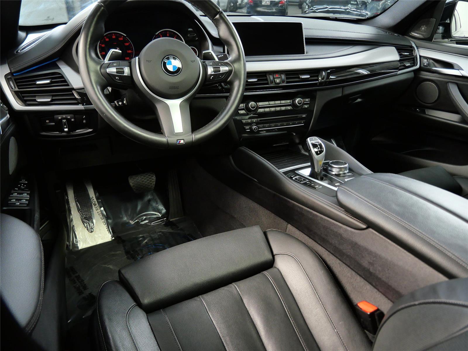 Used 2018 BMW X6 xDrive50i with VIN 5UXKU6C58J0Z66636 for sale in Minnetonka, Minnesota