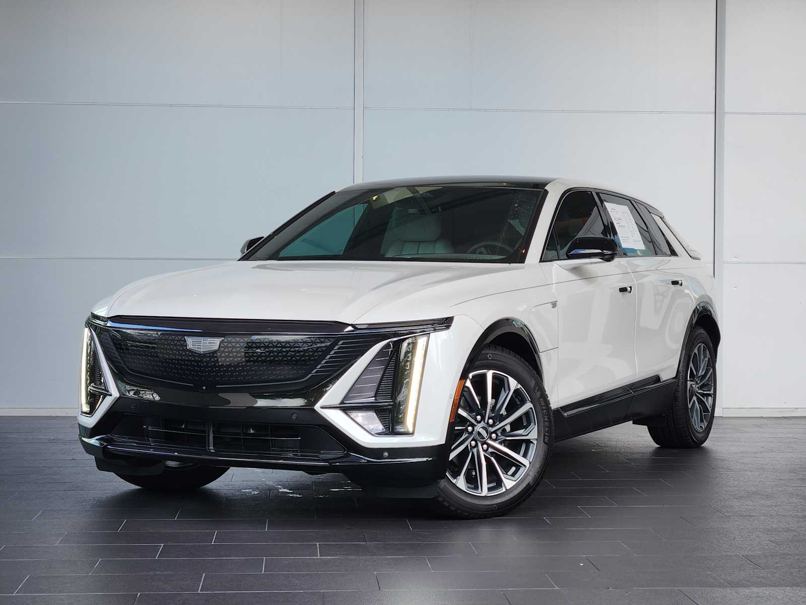 New 2025 Crystal White Tricoat Cadillac Sport 1 image 1