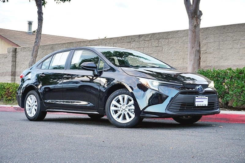 Used 2024 Black Toyota LE image 1