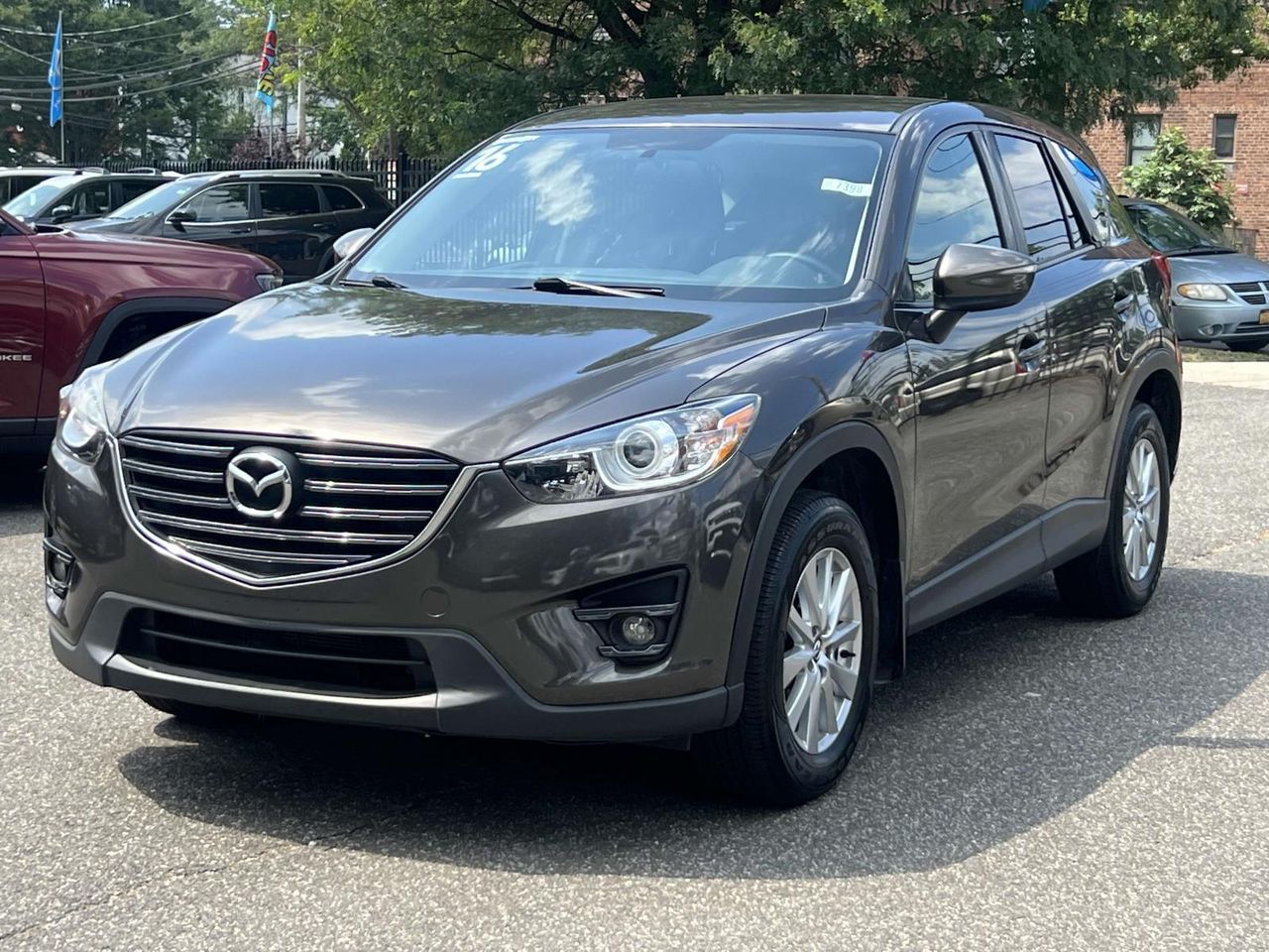 Used 2016 Mazda CX-5 Touring with VIN JM3KE4CY1G0908770 for sale in Huntington, NY