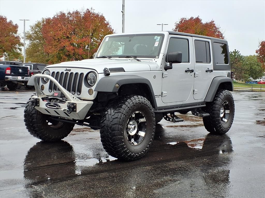 Used 2012 Jeep Wrangler Unlimited Sport with VIN 1C4BJWDG5CL259392 for sale in Kansas City