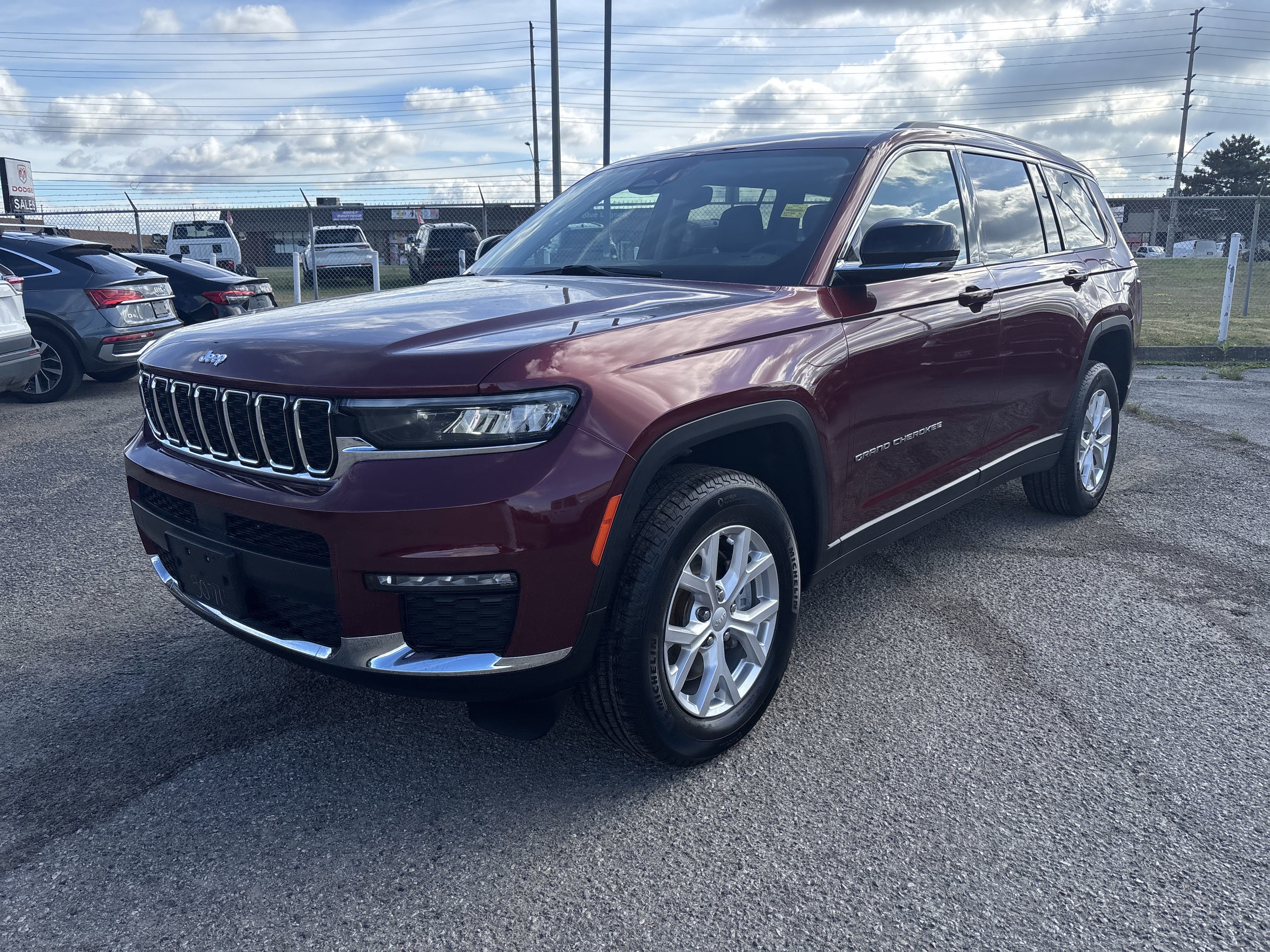 Used 2023 VELVET RED Jeep Limited image 1