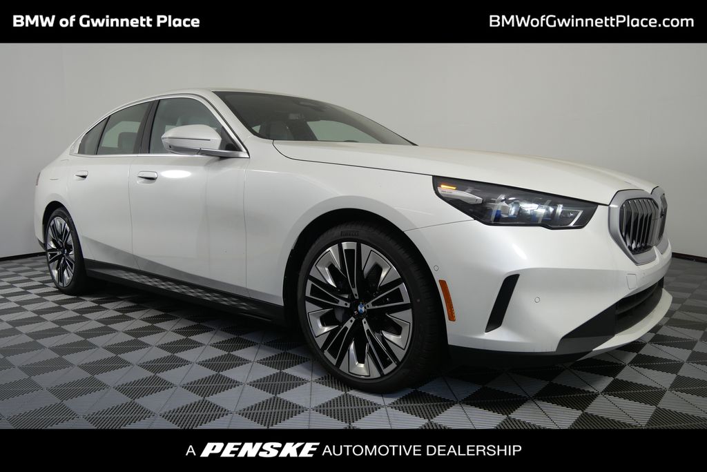 New 2025 Mineral White Metallic BMW 530i image 1