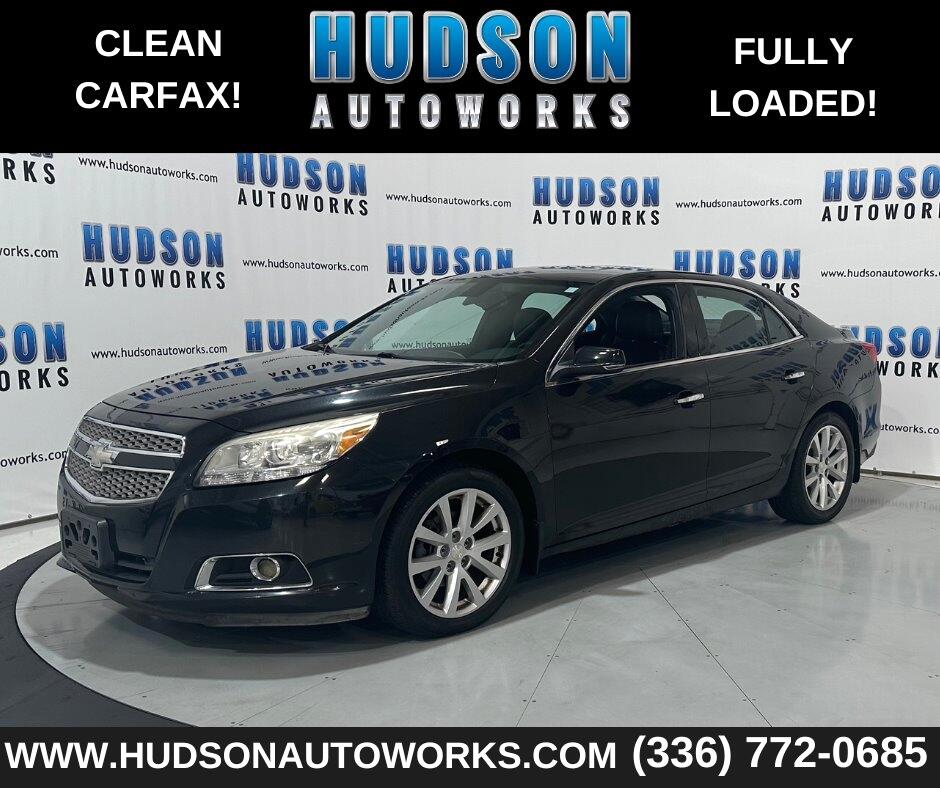 Used 2013 Black Chevrolet LTZ image 1