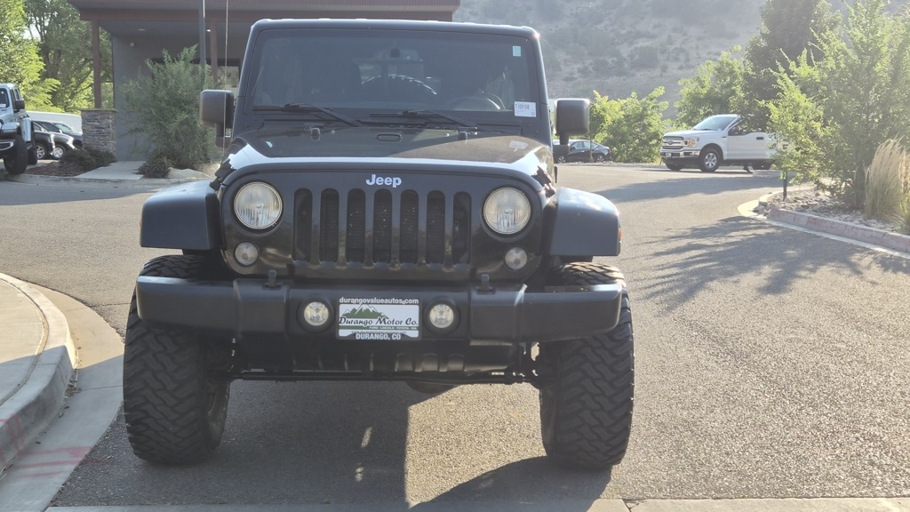 Used 2014 Jeep Wrangler Unlimited Sport with VIN 1C4BJWDGXEL135847 for sale in Durango, CO
