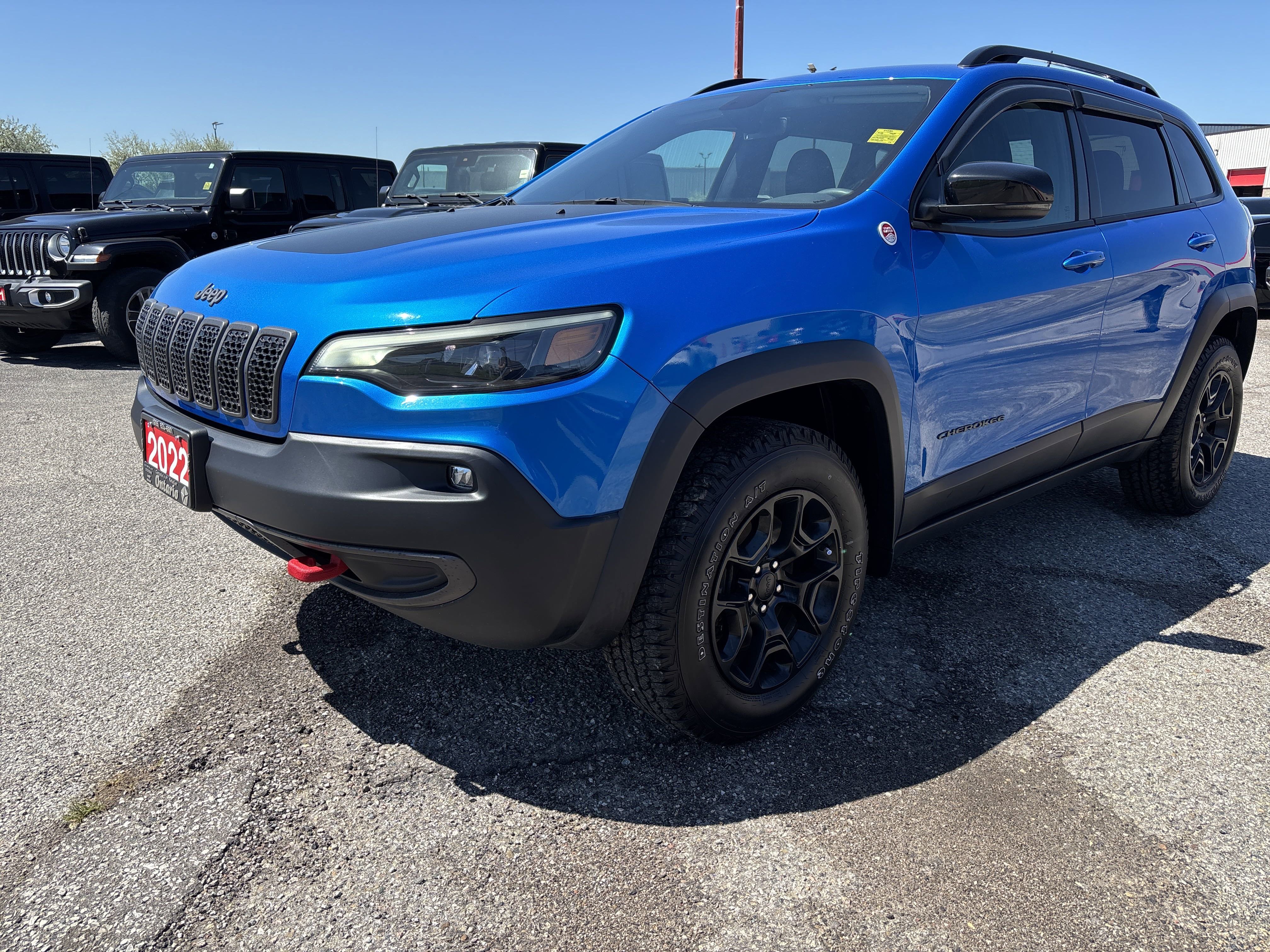 Used 2022 Hydro Blue Pearl Jeep Trailhawk image 1